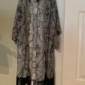 Steve Madden Short sleeve duster with fringes. 100%polyester sheet fabric